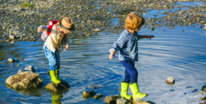 Happy,Kids,Enjoying,On,Beautiful,River.,Little,Toddlers,On,Summer