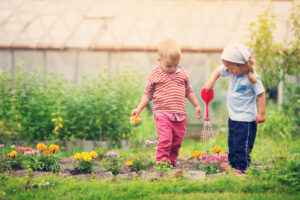 Boy and boy playing in the garden
